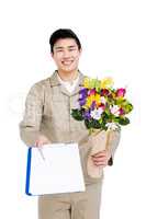 Delivery man with a bouquet and clipboard