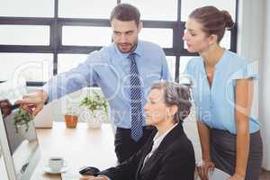 Businessman explaining colleagues