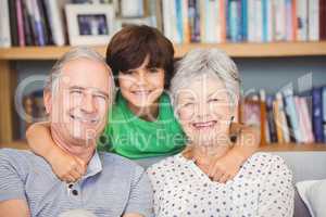 Portrait of grandson with grandparents