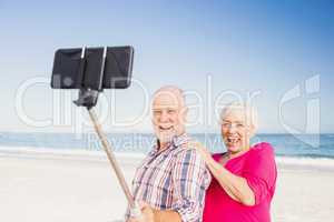 Senior couple taking selfie