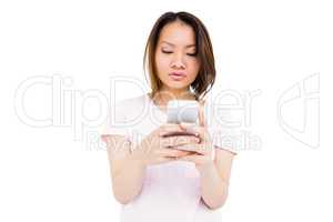 Young woman text messaging on mobile phone