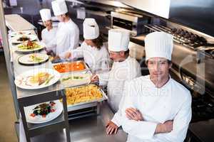 Portrait of chef in commercial kitchen