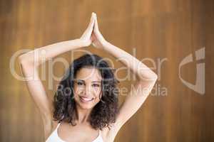 Portrait of young woman practicing yoga