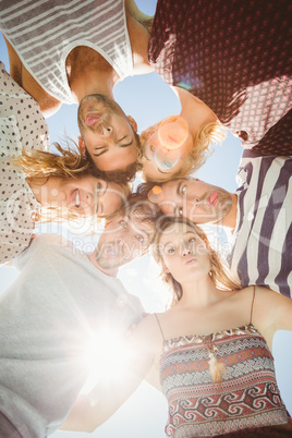 Group of friends forming a huddle