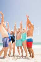 Senior friends cheering together