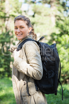 Smiling woman with backpack Smiling woman with backpack
