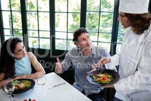 Couple complaining about the food to chef