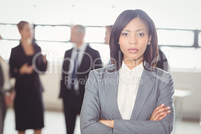 Attractive businesswoman looking at camera