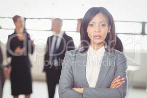 Attractive businesswoman looking at camera