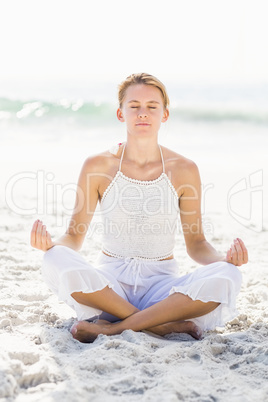 Beautiful woman in lotus position