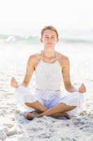 Beautiful woman in lotus position