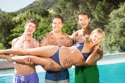 Happy friends enjoying at the swimming pool Happy friends enjoying at the swimming pool