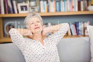 Senior woman suffering from neck pain