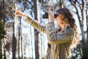 Woman using binoculars