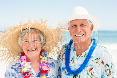 Senior couple standing at the beach