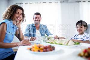 Family sitting at breakfast table
