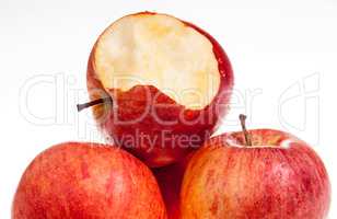 one red apple biten off on isolated background