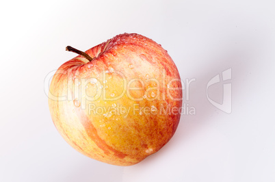 one yellow apple with isolated background