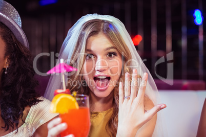 Woman showing her engagement ring