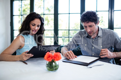 Couple discussing menu