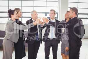 Team of businesspeople toasting champagne