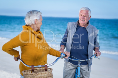 Senior couple with bikes