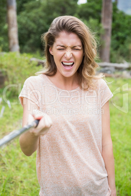 Smiling woman taking selfies