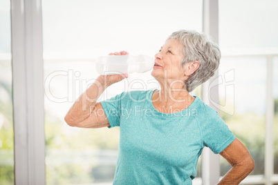 Senior woman drinking water