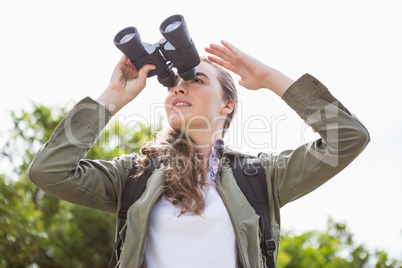 Woman using binoculars