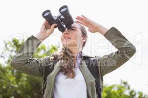 Woman using binoculars