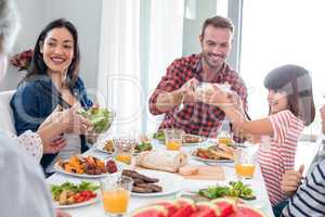 Happy family having breakfast