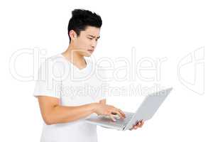 Young man using laptop