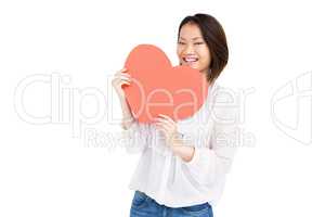 Woman holding heart shape