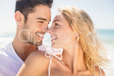 Smiling young couple hugging
