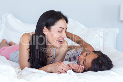 Woman relaxing with her daughter