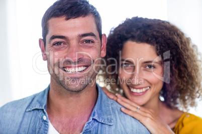 Portrait of happy couple smiling