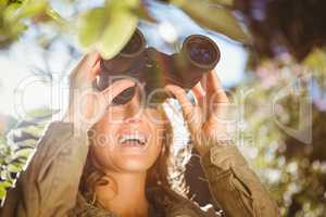 Woman using binoculars