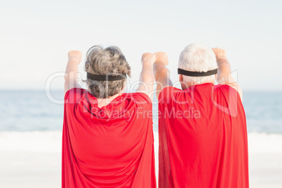 Seniors wearing superman costume