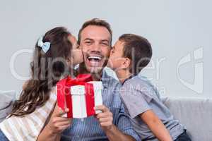 Father holding a gift