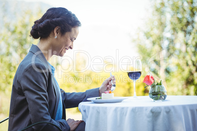 Businesswoman having a desert