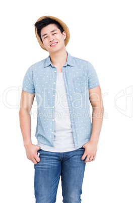 Young man standing with hands in pocket