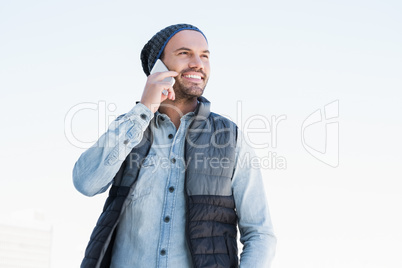 Young man talking on mobile phone