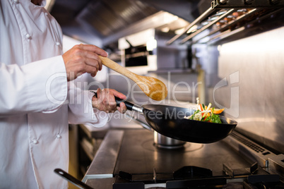 Chef preparing food in the kitchen