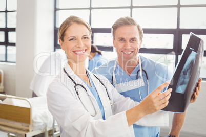 Doctors examining an x-ray in hospital