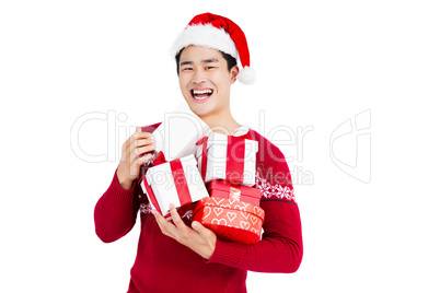 Young man holding gift box