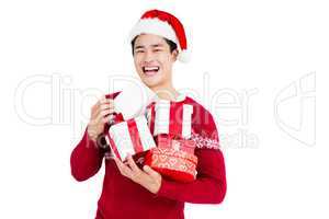 Young man holding gift box