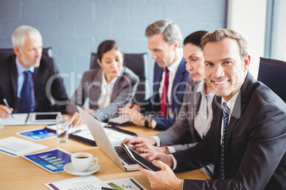 Businesspeople in conference room