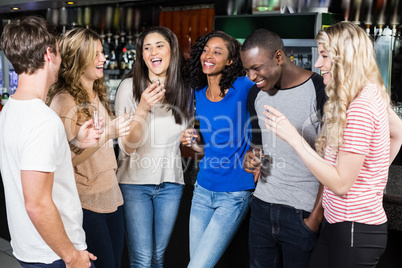 Group of friends drinking shots