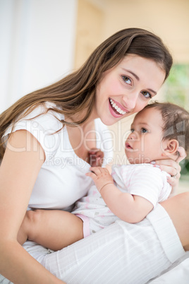 Portrait of happy mother with baby