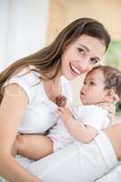 Portrait of happy mother with baby